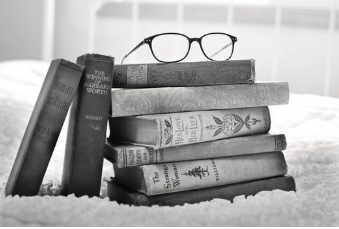 Stack of Books with glasses